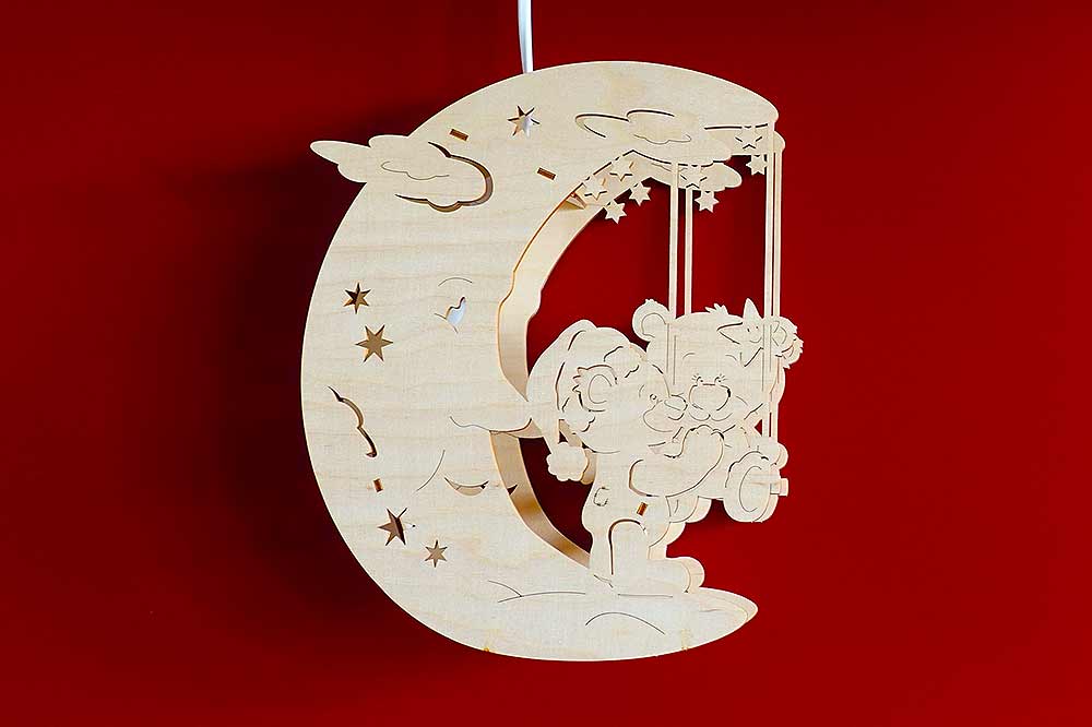 Fensterbild beleuchtet Mond mit Teddys
