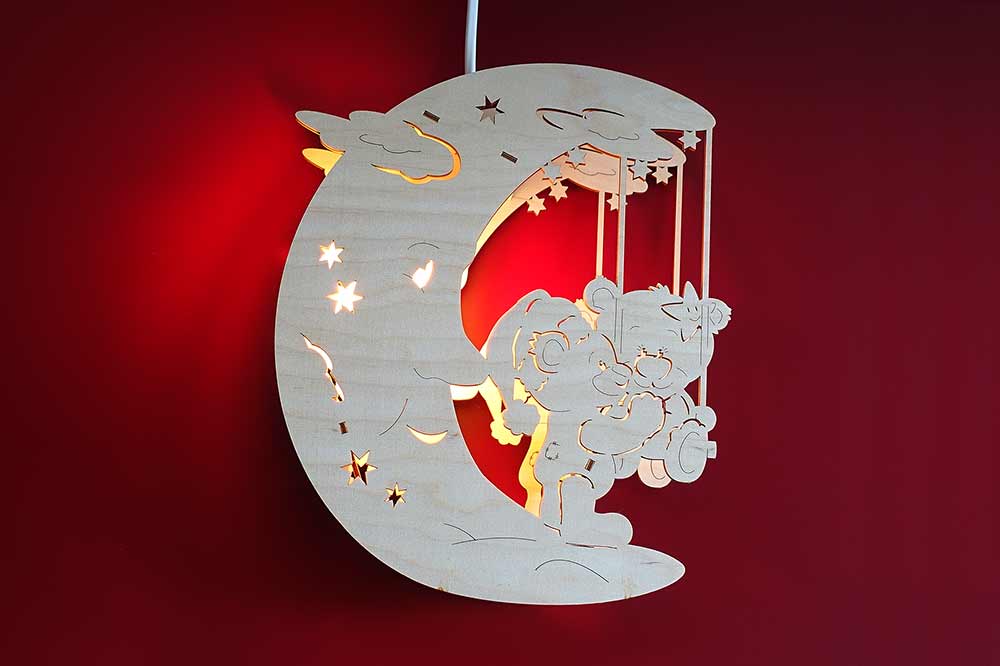 Fensterbild beleuchtet Mond mit Teddys